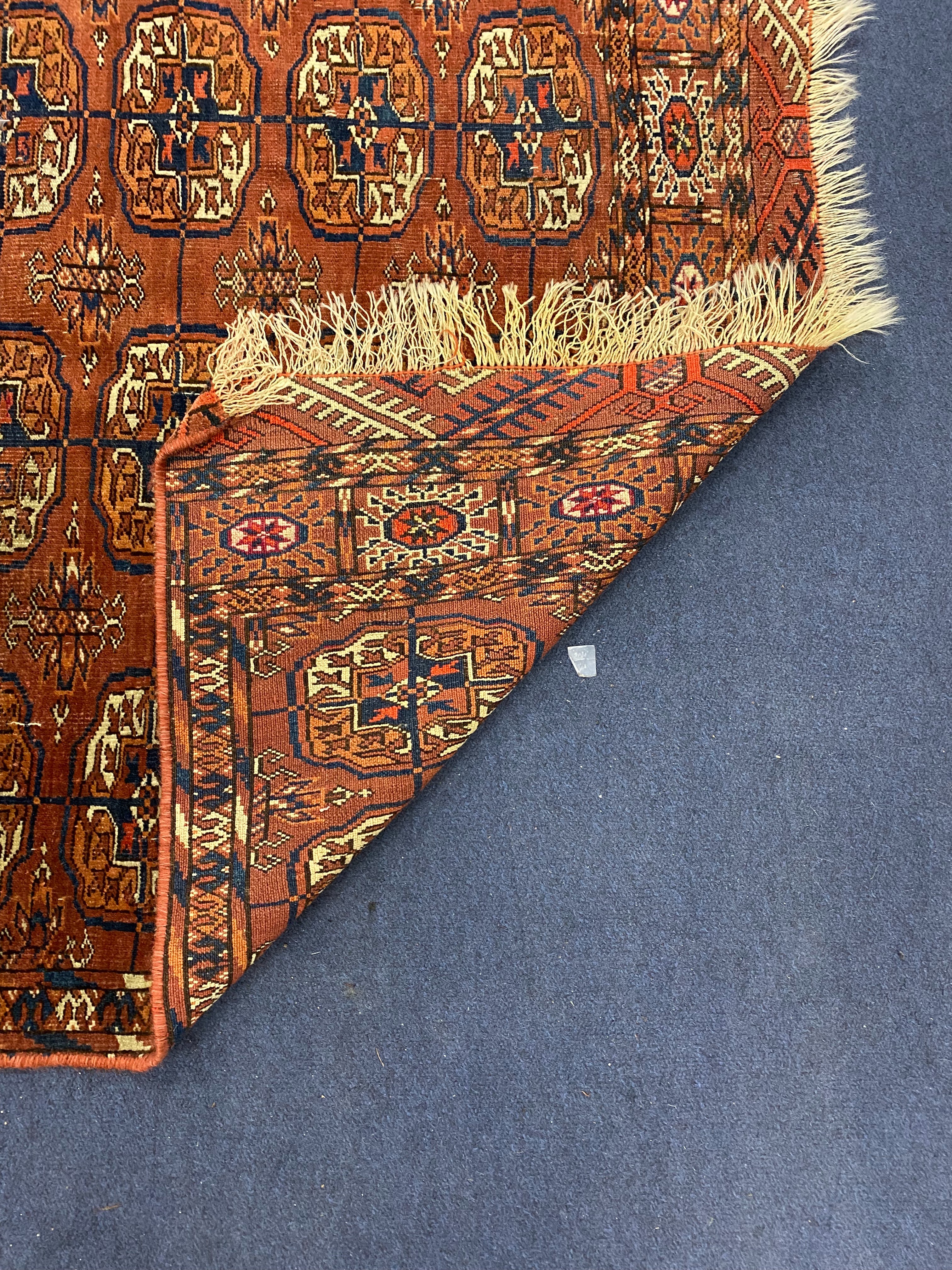 A Tekke Turkoman red ground rug, 130 x 85cm
